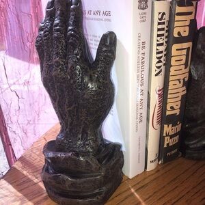 Vintage hands bookends book ends